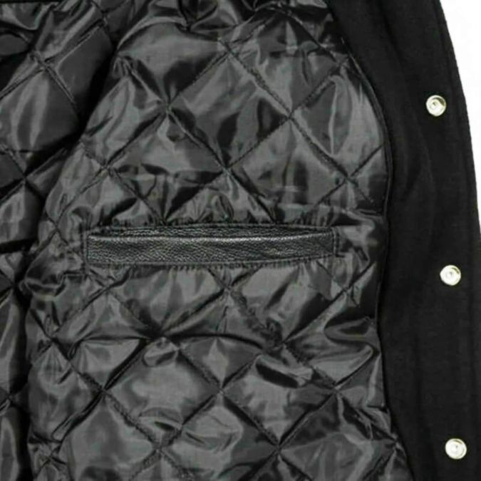 black and purple varsity jacket